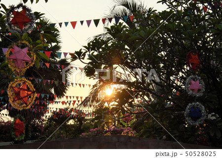 Multicolored festive street decorations.  50528025