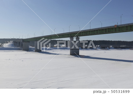 Road bridge over the river in the city Sukhona 50531699