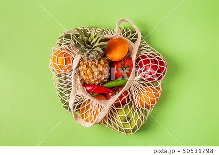 Fresh vegetables and fruits in bag mesh. Fresh vegetables and fruits in bag mesh. 50531798