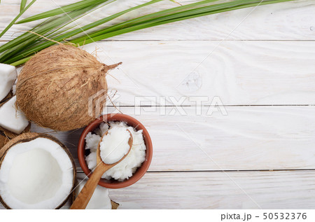 Flat lay Background of coconut, coconut shell, oil Flat lay Background of coconut, coconut shell, oil 50532376