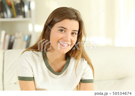 Portrait of a happy teen girl at home 50534674