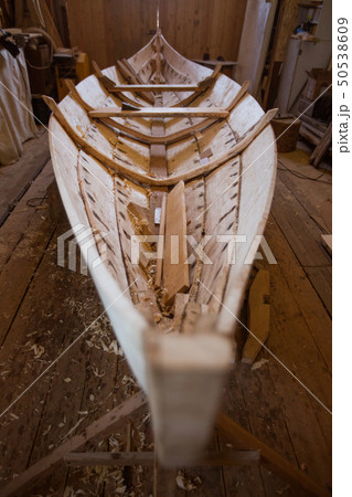Wooden boat in the barn Wooden boat in the barn 50538609