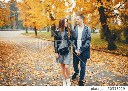Couple in autumn park Couple in autumn park 50538929