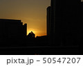 夕焼けのビル街 50547207