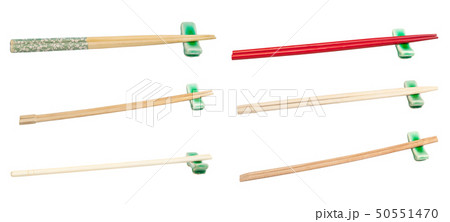set of various wooden chopsticks on rest isolated 50551470
