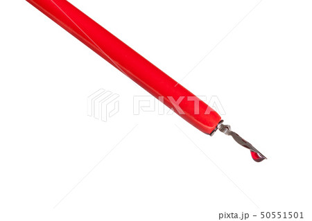side view of ink drop in red nib pen close up side view of ink drop in red nib pen close up 50551501