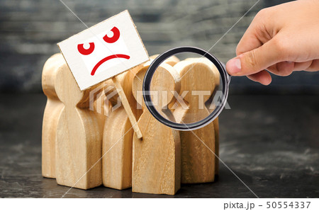 Magnifying glass is looking at an angry mob Magnifying glass is looking at an angry mob 50554337