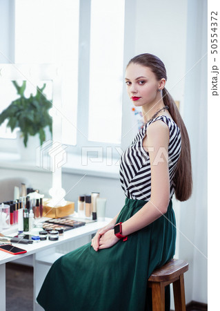 Nice beautiful young woman looking at you Nice beautiful young woman looking at you 50554372