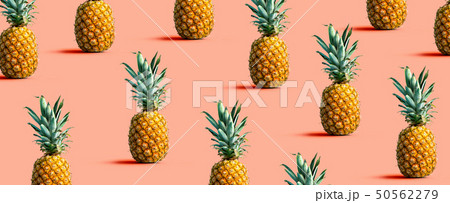Pineapples on a solid color background Pineapples on a solid color background 50562279