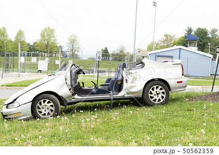 crashed car on field 50562359