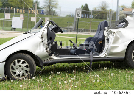 crashed car on field crashed car on field 50562362
