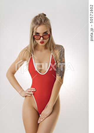 Sexy Lady in Red Swimsuit 50571602
