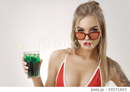 Woman in Bikini With Drink Woman in Bikini With Drink 50571603