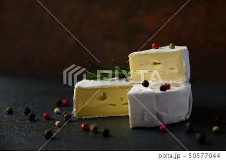 Cheese camembert or brie with fresh rosemary Cheese camembert or brie with fresh rosemary 50577044