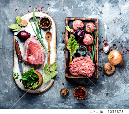 Raw uncooked meatballs 50578784