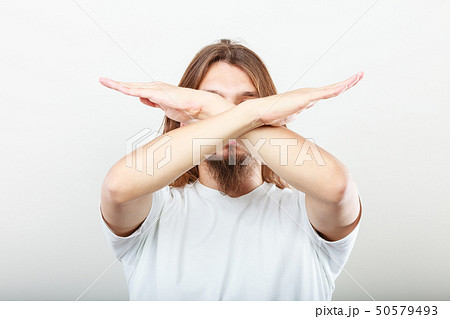 Man making stop sign Man making stop sign 50579493