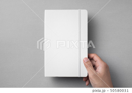 white notebook isolated on grey background white notebook isolated on grey background 50580031