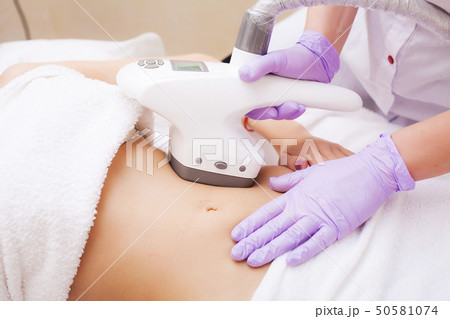 Body Care. Woman is in the process at the clinic lipomassage 50581074