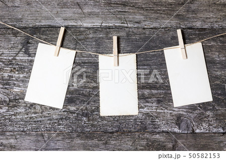Three old blank photos on the cord. Woodesk desk 50582153