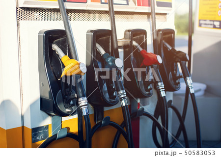 Dirty fuel nozzle in oil dispenser with gasoline 50583053
