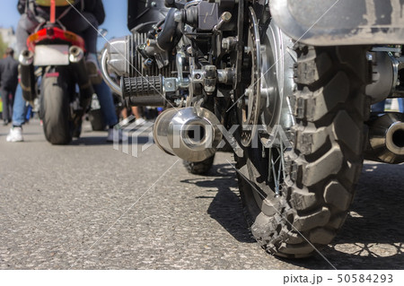 Motorcycle rear wheel and exhaust pipe 50584293