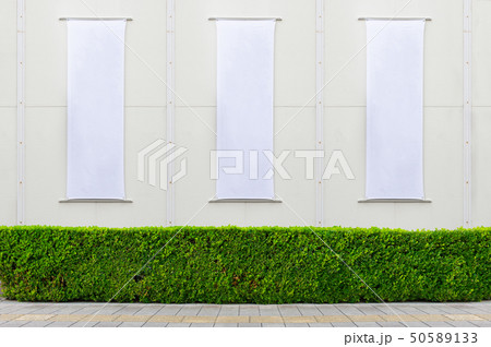 Large blank billboard on a street wall, banners Large blank billboard on a street wall, banners 50589133