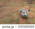 Travel concept. Toy cars on vintage World map 50589569