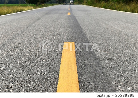 old asphalt road in countryside old asphalt road in countryside 50589899