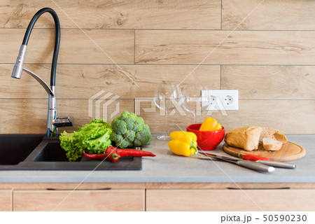 Fresh vegetables for salad on a kitchen table. Natural organic healthy food 50590230
