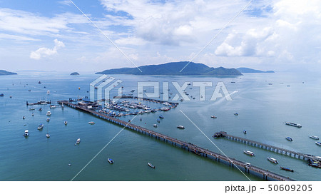 Chalong pier with sailboats for travel image by Chalong pier with sailboats for travel image by 50609205