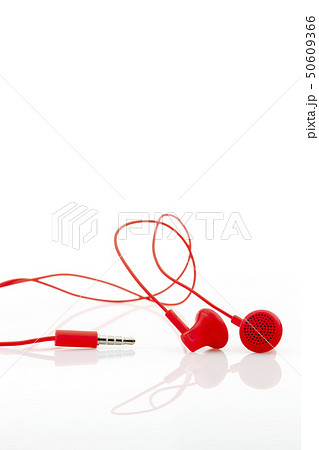 Red earphone isolated on a white background 50609366