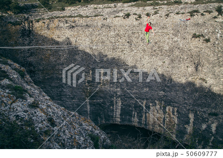 Man on high line. 50609777