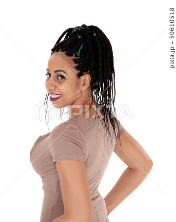 Woman with braided black hair in profile portrait 50610518