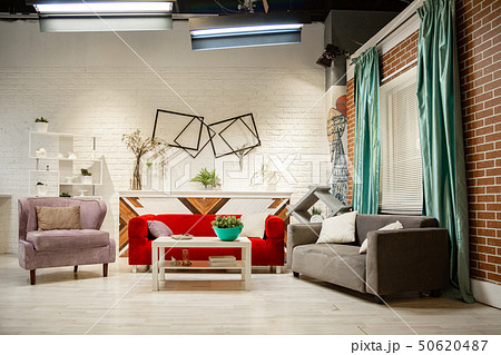 Photo studio in the style of the living room. Classic furniture, sofa, armchairs fireplace. Photo studio in the style of the living room. Classic furniture, sofa, armchairs fireplace. 50620487