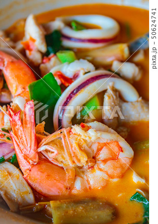 Mixed seafood hot and spicy soup, thai cuisine. Mixed seafood hot and spicy soup, thai cuisine. 50624741