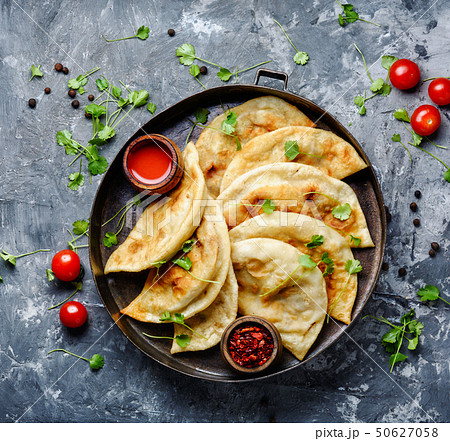 Cheburek,dough pie with meat filling Cheburek,dough pie with meat filling 50627058