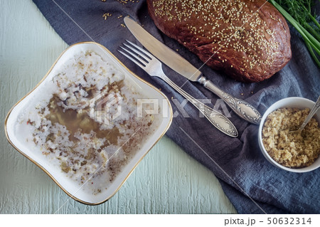 Pork jelly on the table. The view from the top. Pork jelly on the table. The view from the top. 50632314