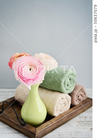Color towels on vintage tray Color towels on vintage tray 50637079