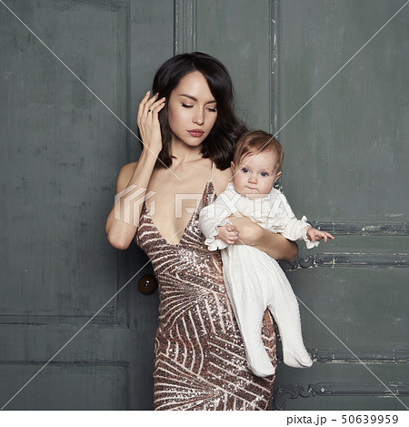 Young mother with beautiful little baby in her Young mother with beautiful little baby in her 50639959
