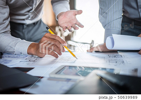 Construction engineering or architect discuss a Construction engineering or architect discuss a 50639989