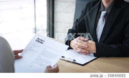 Employer arriving for a job interview, businessman 50640092