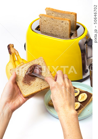 yellow toaster on a pink background yellow toaster on a pink background 50646702