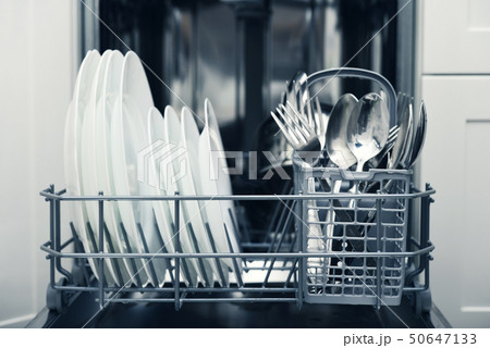 Clean cutlery and plates 50647133