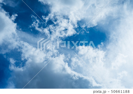 Incredibly beautiful clouds against a sunny blue 50661188