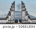 Man is standing in the gate of Lempuyang temple 50661894