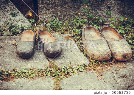 Wooden dutch shoes, traditional clogs footwear Wooden dutch shoes, traditional clogs footwear 50663759