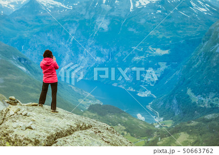 Tourist taking photo from Dalsnibba viewpoint 50663762