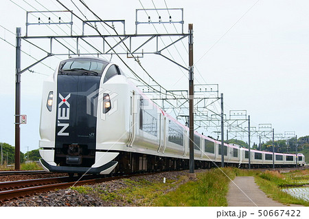 モノサクのカーブを通過する成田エクスプレス 50667422