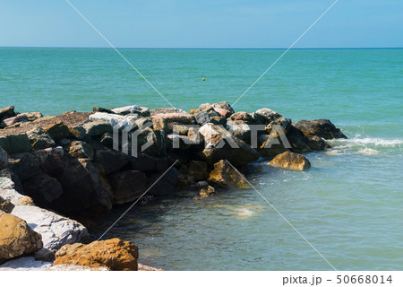 Beautiful azure sea and the rocky beach 50668014