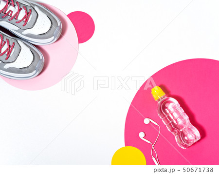 Sport shoes, bottle of water and headphones. Sport shoes, bottle of water and headphones. 50671738